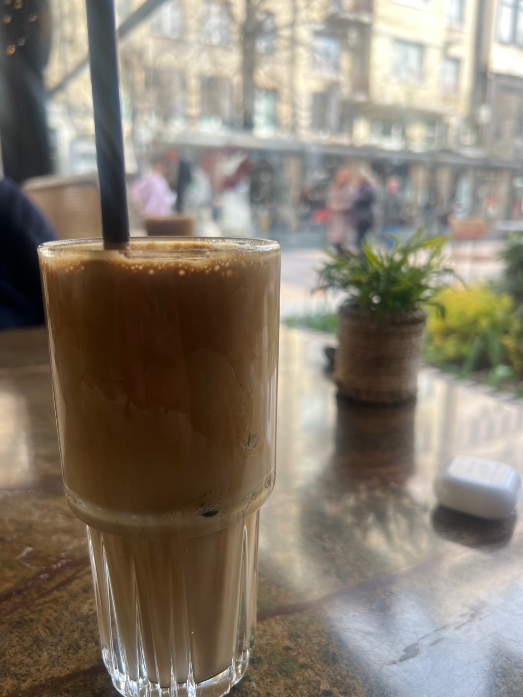 Coffee by a café window on the final day in Sofia